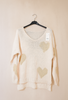 Pull col v coeur brillant de couleur beige 
Les pépites de Christelle