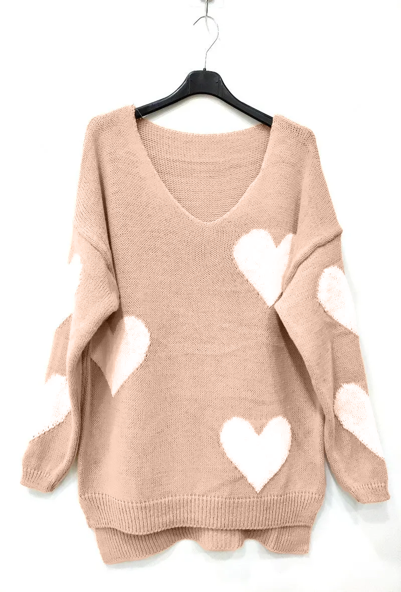 Pull col V en coeur rose clair 
Les pépites de Christelle