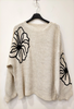Pull à fleur beige 
Les pépites de Christelle