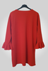 pull col rond orange vif, avec des manches bouffantes volumineuses, soulignant le style tendance et la matière douce - Les pépites de Christelle.