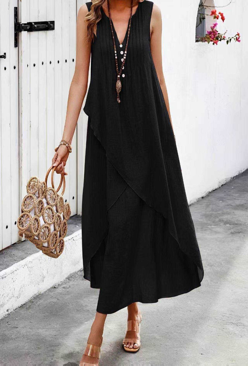 Robe sans manches de couleur noir style bohème.

Les pépites de Christelle
